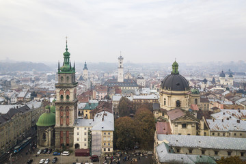 Fototapeta na wymiar Aerial: Cityscape of Lviv in misty weather