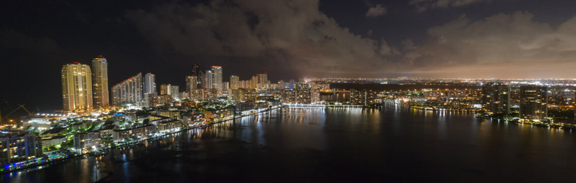 Aerial city and bay panorama night photo