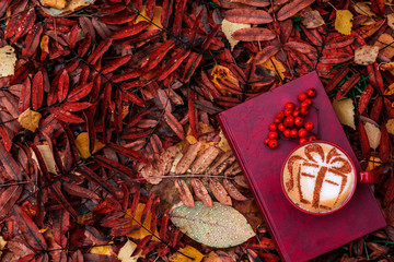 Christmas cappuccino with a gift picture