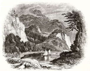 Wonderful cove in the deep nature with little white sail boats and high rocks on background. Old view of Loch Katrine Scotland. By unidentified author published on Magasin Pittoresque Paris 1839