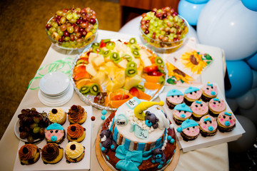 Beautiful cake with cakes in honor of the birth of a son