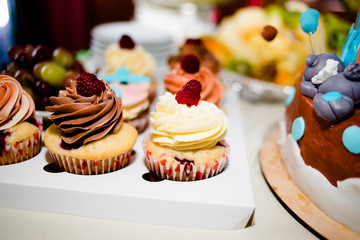 Beautiful cake with cakes in honor of the birth of a son