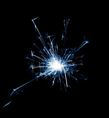 Closeup detail of burning sparkle on black background