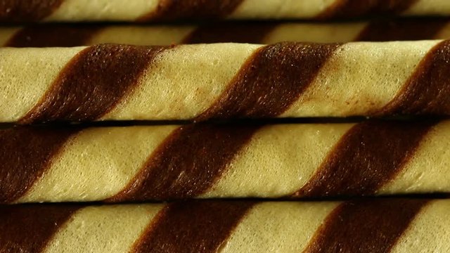 man doll on the rolled wafer stick, abstract concept
