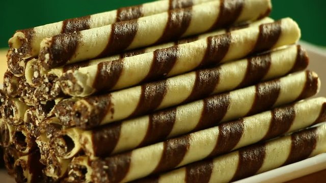 Pile of rolled wafer stick with chocolate cream