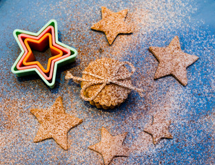 Christmas cookies with flour and cocoa topping