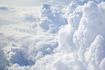 Naklejka na ściany i meble beautiful of cloud on sky take photo on plane. subject is blurred.