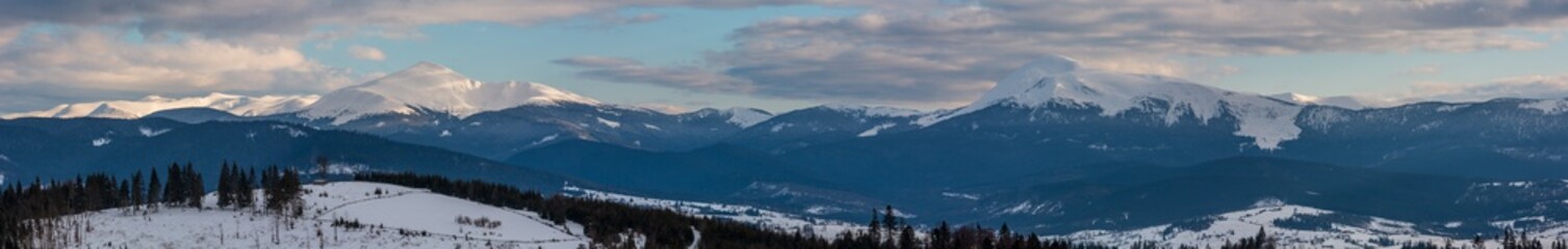 Evening winter cloudy day mountain ridge