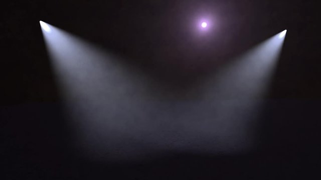 Spotlights shining on empty dark stage. Background with lights and smoke. Concept of theater, concert or nightclub.