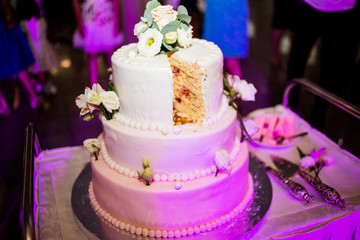 A wonderful wedding cake in the festive hall