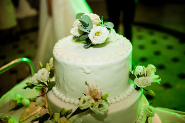 A wonderful wedding cake in the festive hall