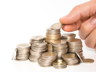 turkishish coins lined up in a row on a white background. and that adding on of hands
