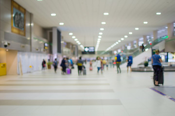 blur of people at airport.