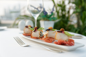 Smoked pork, basil, almond and red tapioca chips