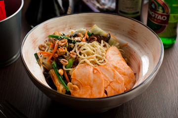Chinese food: chicken with noodles and peanuts