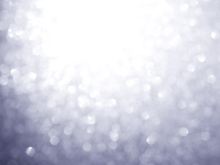 Silver abstract blured background and white bokeh
