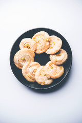 Chirote or Chiroti is a sweet dish from Karnataka and Maharashtra. Served in a plate as a dessert on Festivals or wedding. Selective focus