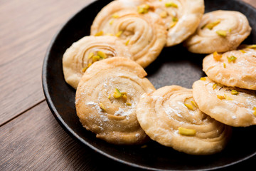 Chirote or Chiroti is a sweet dish from Karnataka and Maharashtra. Served in a plate as a dessert on Festivals or wedding. Selective focus