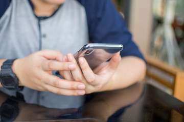 people holding smartphone and use. soft focus.