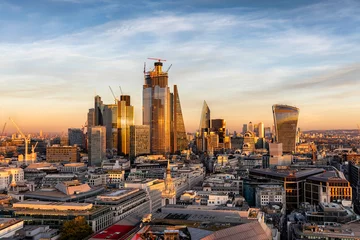 Fotobehang Londen De moderne skyline van de City of London bij zonsondergang