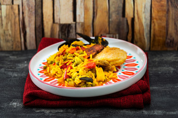Paella with chicken, seafood and chorizo