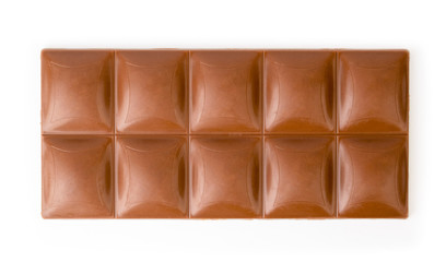 Milk chocolate bar top view on white background.
