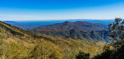Mountains on a blue sky day, fall season.