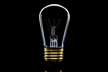 Light bulb on black background