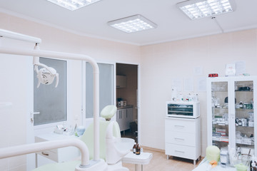 Dental clinic interior. Dentistry, medicine and stomatology concept. White tone.