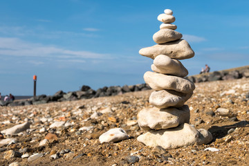 Fototapeta na wymiar Pile of stones on a beach
