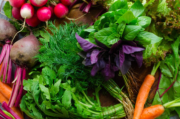 Background texture with assorted raw organic vegetables