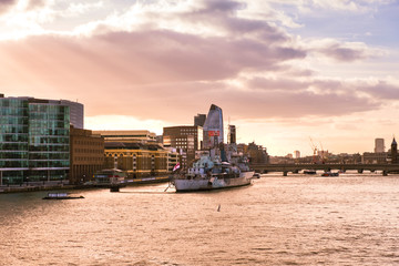 HMS Belfast museum on the river Thames at sunset