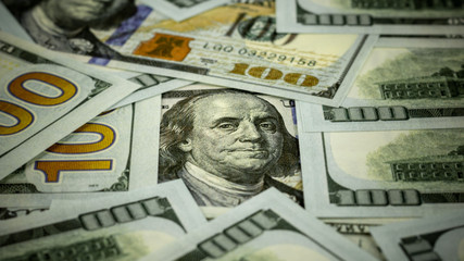 Benjamin Franklin's look on a hundred dollar bills.