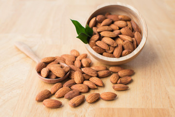 almond on wooden table. soft focus.