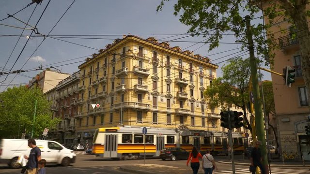 milan city sunny day traffic street crossroad slow motion panorama 4k italy
