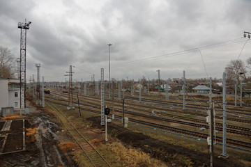 Old abandoned railway station on an overcast autumn day