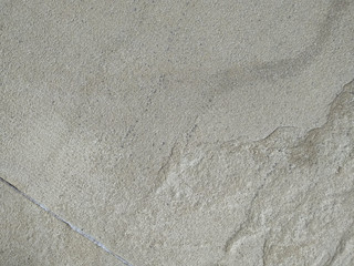 Natural textural gray grunge background. The old wall of the old castle