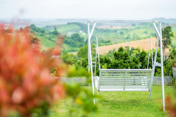 Fototapeta premium Mountain porch swinging bench