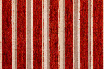 red striped synthetic woven upholstery fabric close-up texture