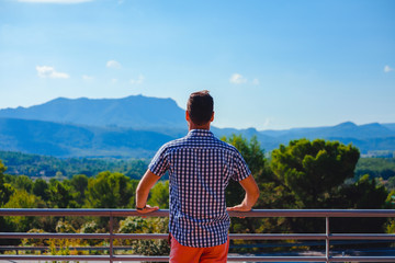 France, Provence. The young man admires the landscape - obrazy, fototapety, plakaty