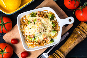 Homemade pasta bake with ham and cheese