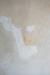 Fototapeta na wymiar bare interior wall background with distressed plaster patina texture