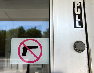 The Sign "No Gun" on the door in Chicago, IL