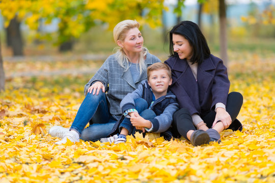 Content Same Sex Female Couple And Son In Park