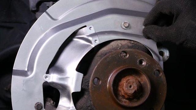 Shiny new backplate on car brake