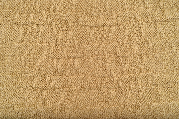 Knitted handmade texture background. Close-up surface.