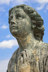 Fototapeta na wymiar Statue of praying angel