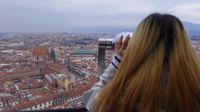 Gerl examine the center of Florence from the top of the dome. Top view of the square in front of Florence Cathedral