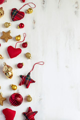 Red and gold deco baubles flat lay