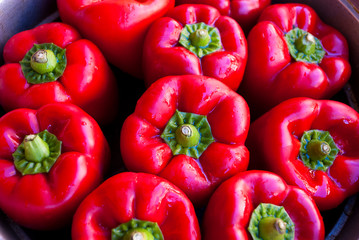 Top view of many red pappers. Paprika macro pattern. Fresh vegetable organic.